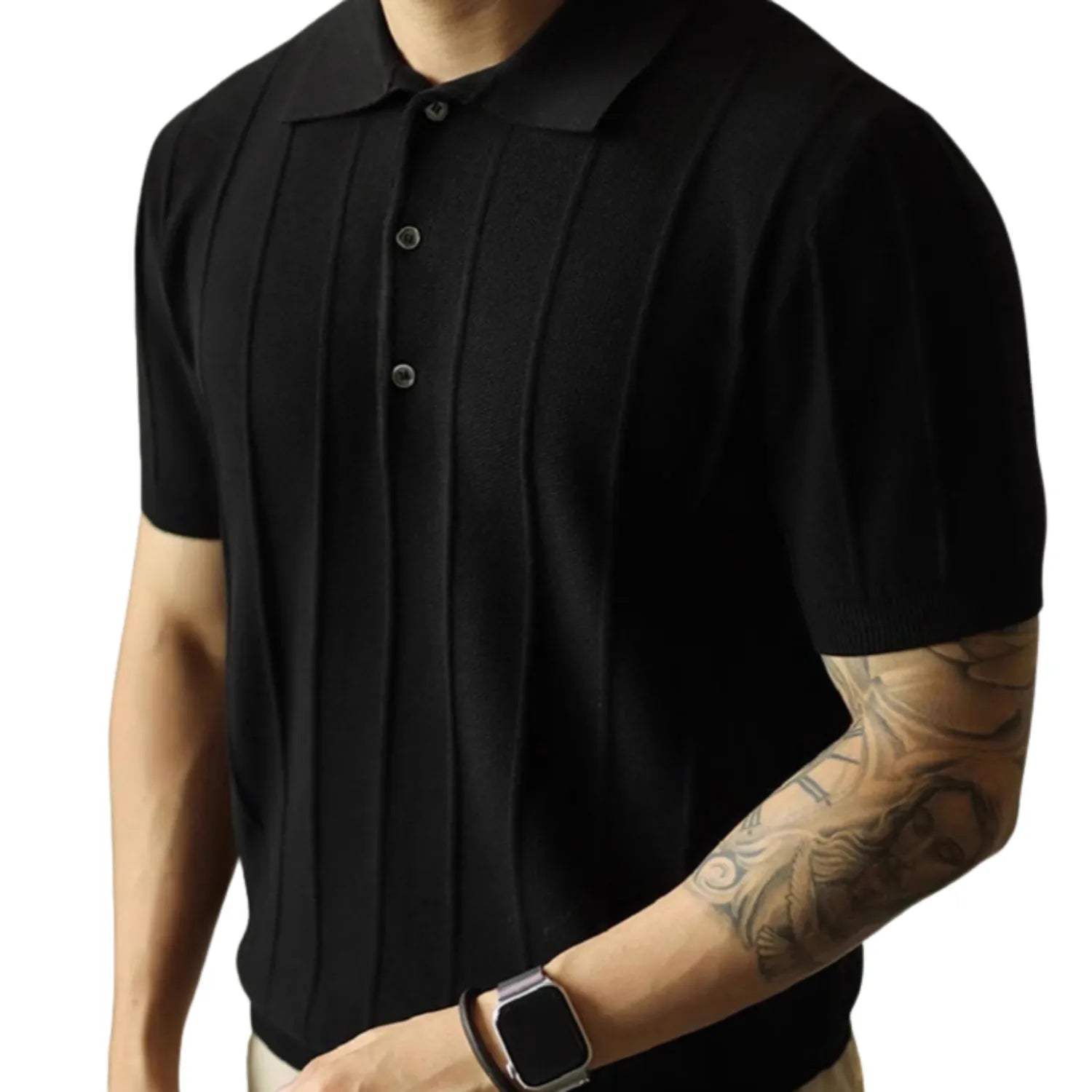Model wearing classic men's polo shirt, showcasing its relaxed fit and modern style in black.