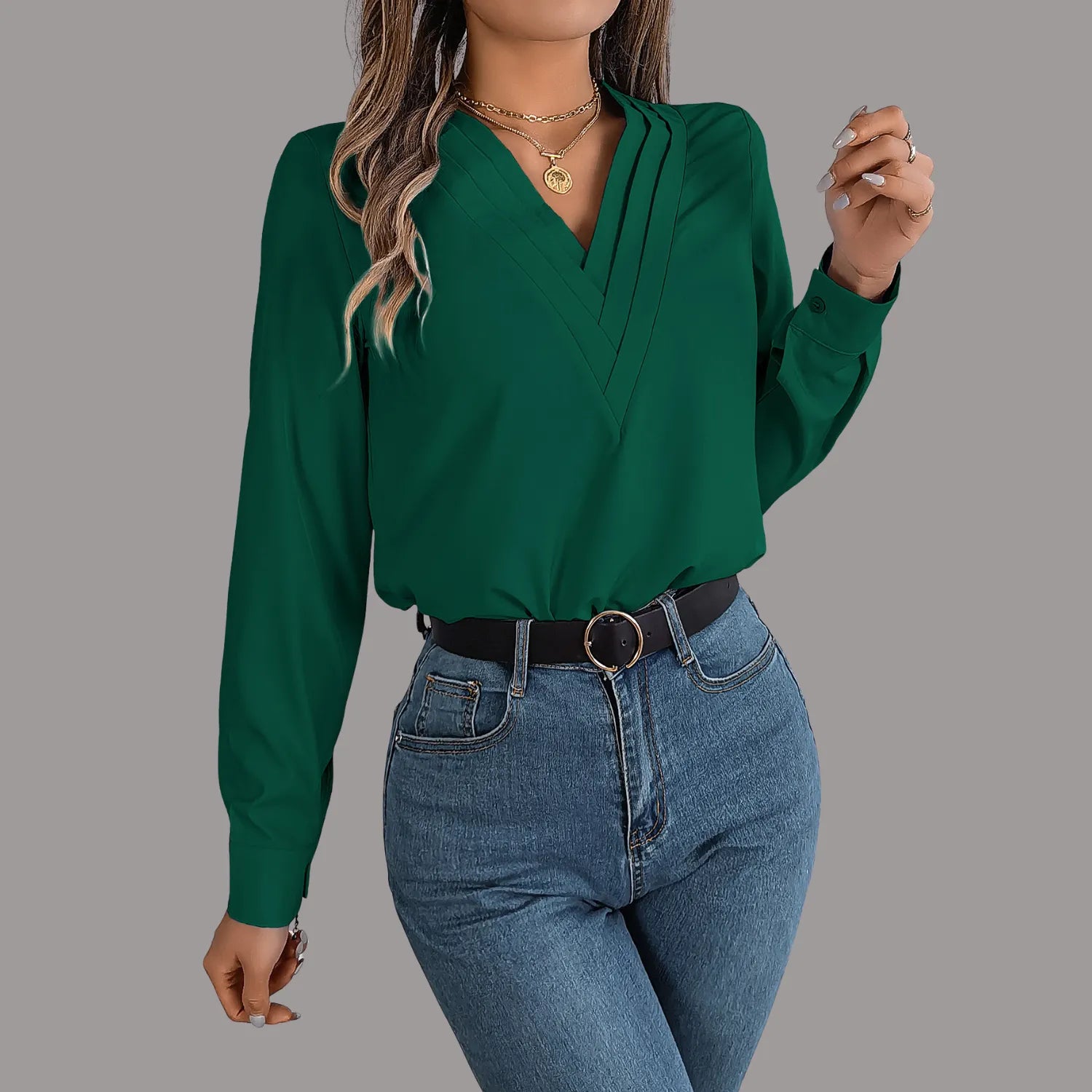 Elegant V-Neck Blouse, featuring a stylish pleated neckline and long sleeves, showcasing a professional look in green.