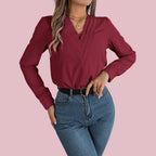 Elegant V-Neck Blouse from Baltere, featuring a stylish pleated neckline and long sleeves, showcasing a professional look in vinho.