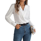 Elegant V-Neck Blouse from Baltere, featuring a stylish pleated neckline and long sleeves, showcasing a professional look in white.