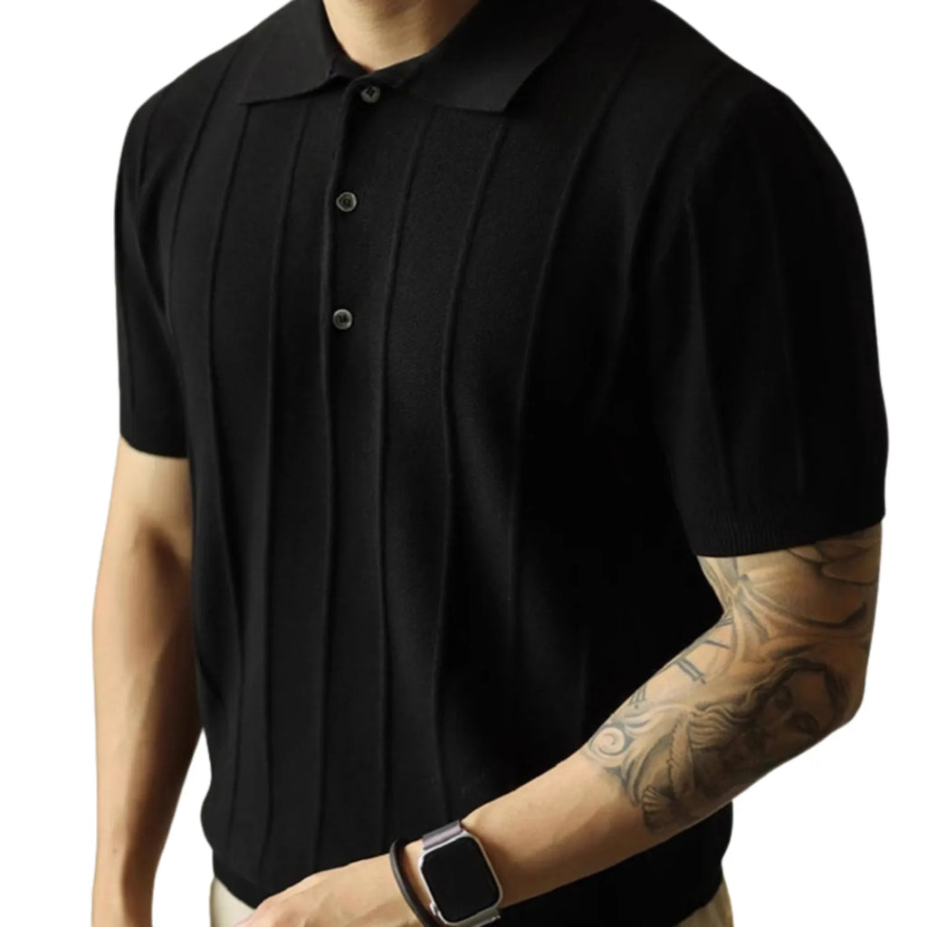 Model wearing classic men's polo shirt, showcasing its relaxed fit and modern style in black.
