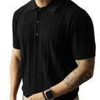 Model wearing classic men's polo shirt, showcasing its relaxed fit and modern style in black.