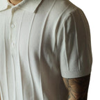 Model wearing classic men's polo shirt, showcasing its relaxed fit and modern style.