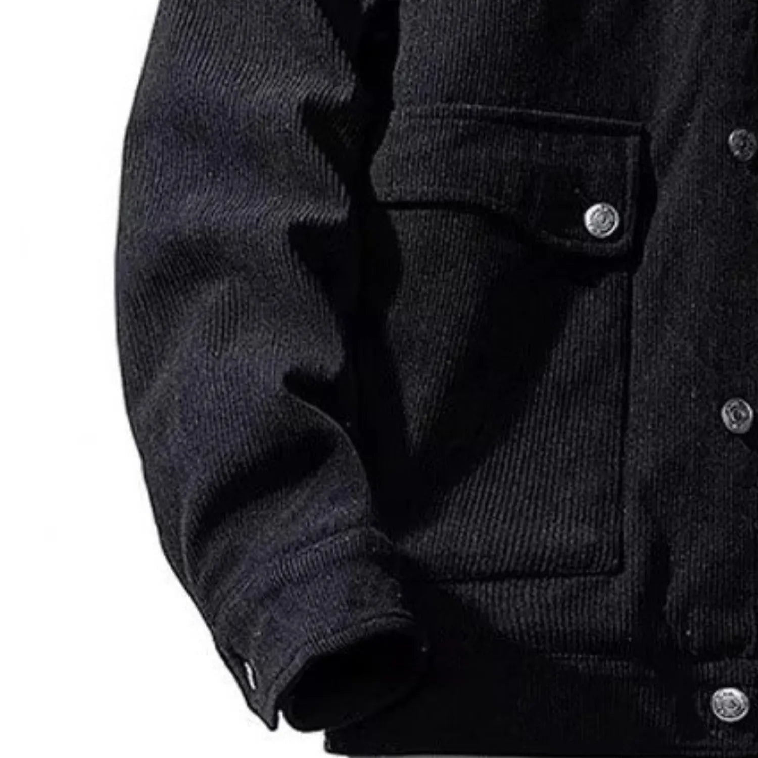 Close-up of the corduroy jacket's ribbed texture.