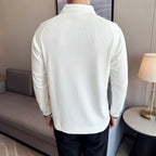 Rear view of the Baltere Men's Half-Zip Polo Shirt, highlighting its seersucker texture and comfortable design.
