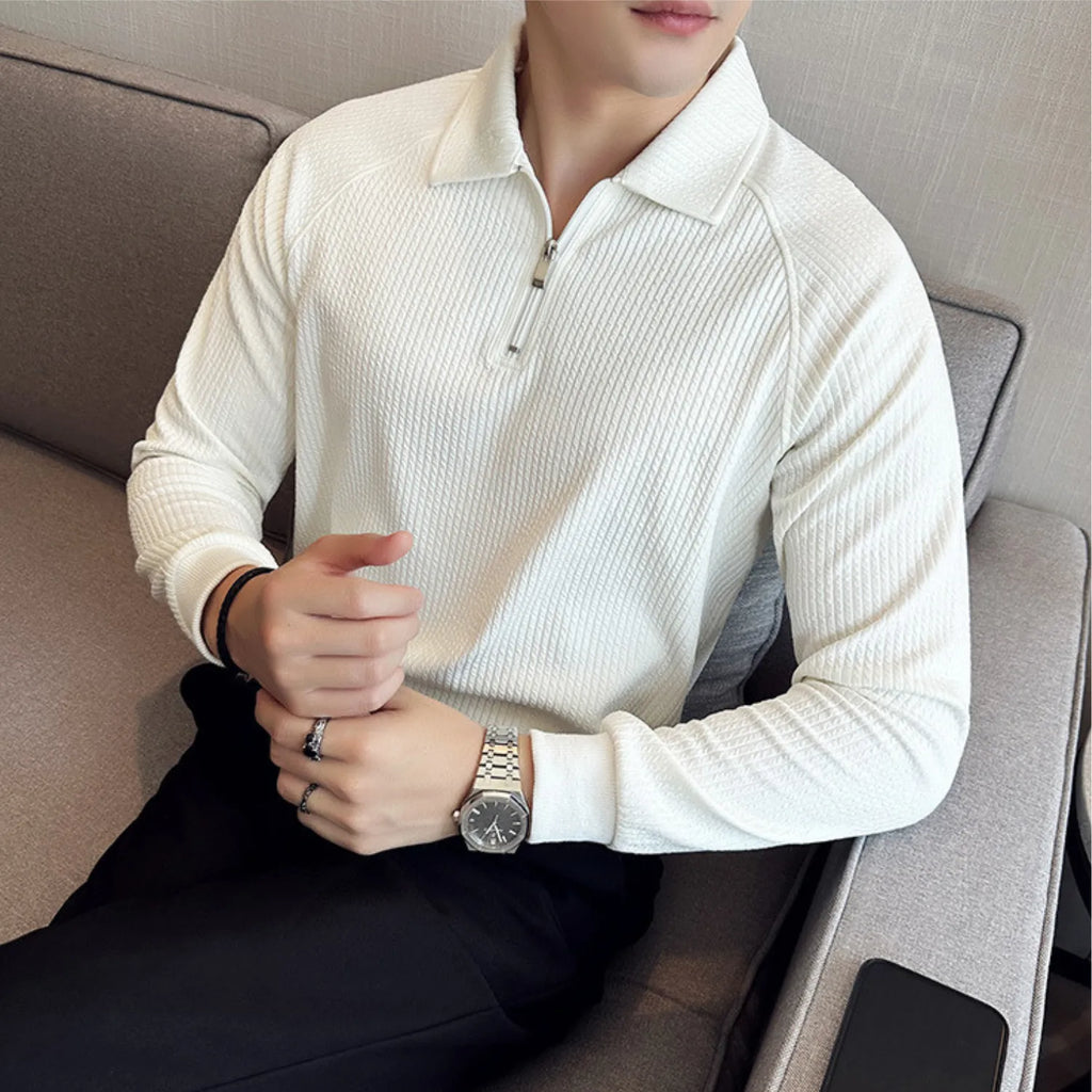 Model wearing Baltere's Half-Zip Polo Shirt, highlighting the textured seersucker fabric and casual yet sophisticated style.