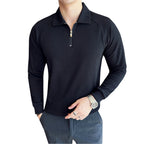 Model wearing Baltere's Men's Half-Zip Polo Shirt, showcasing its high-elastic seersucker texture and polo collar in black.