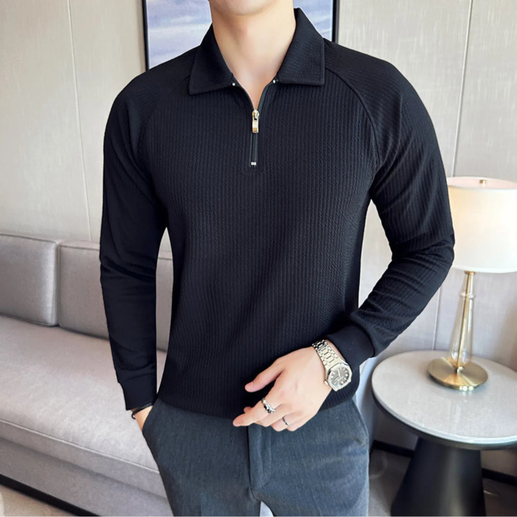 Model wearing Baltere's Men's Half-Zip Polo Shirt, showcasing its high-elastic seersucker texture and polo collar in black.