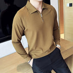 Model wearing Baltere's Half-Zip Polo Shirt, showcasing its unique textured fabric in kahki.