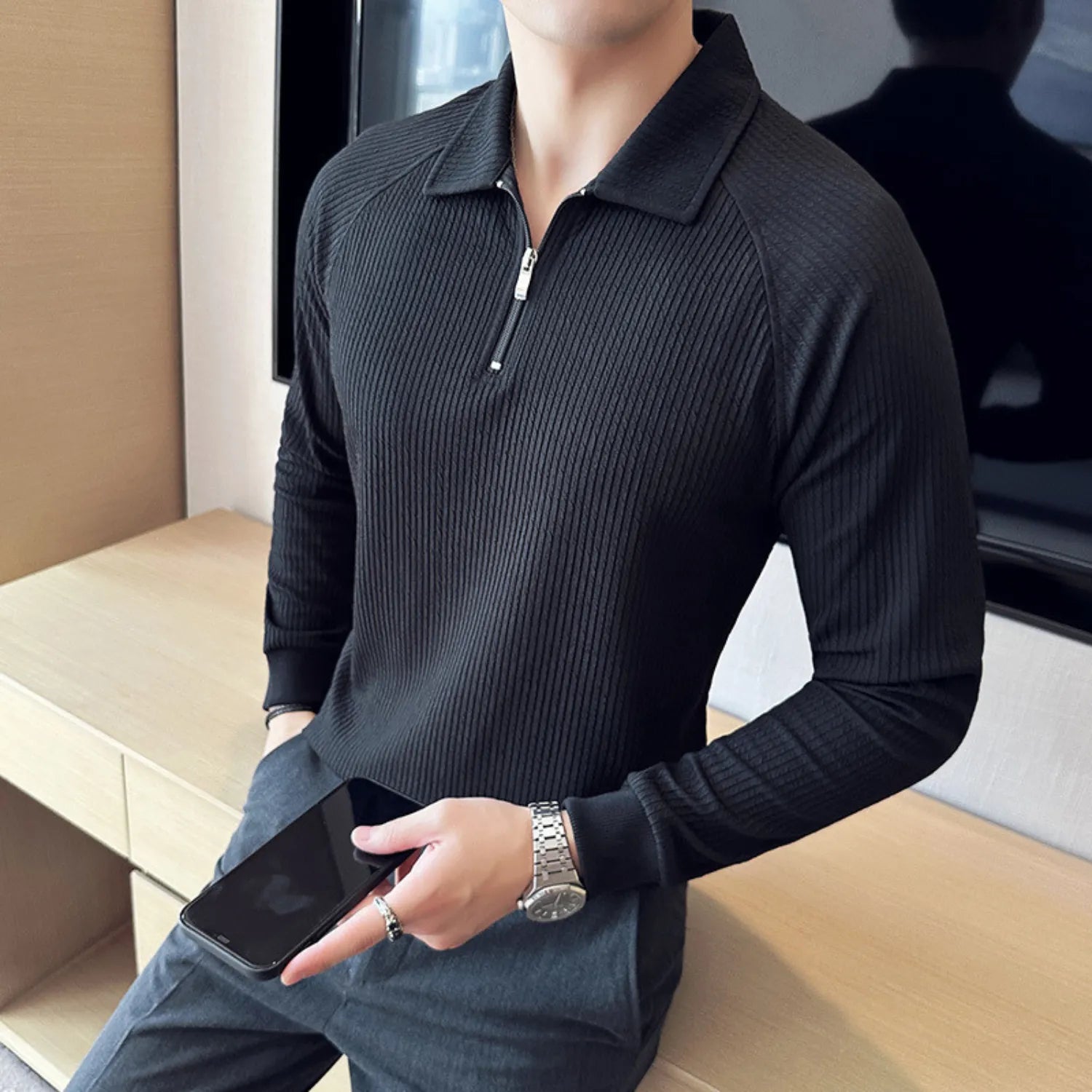 Baltere's Half-Zip Polo Shirt black, highlighting the textured seersucker fabric and casual yet sophisticated style.