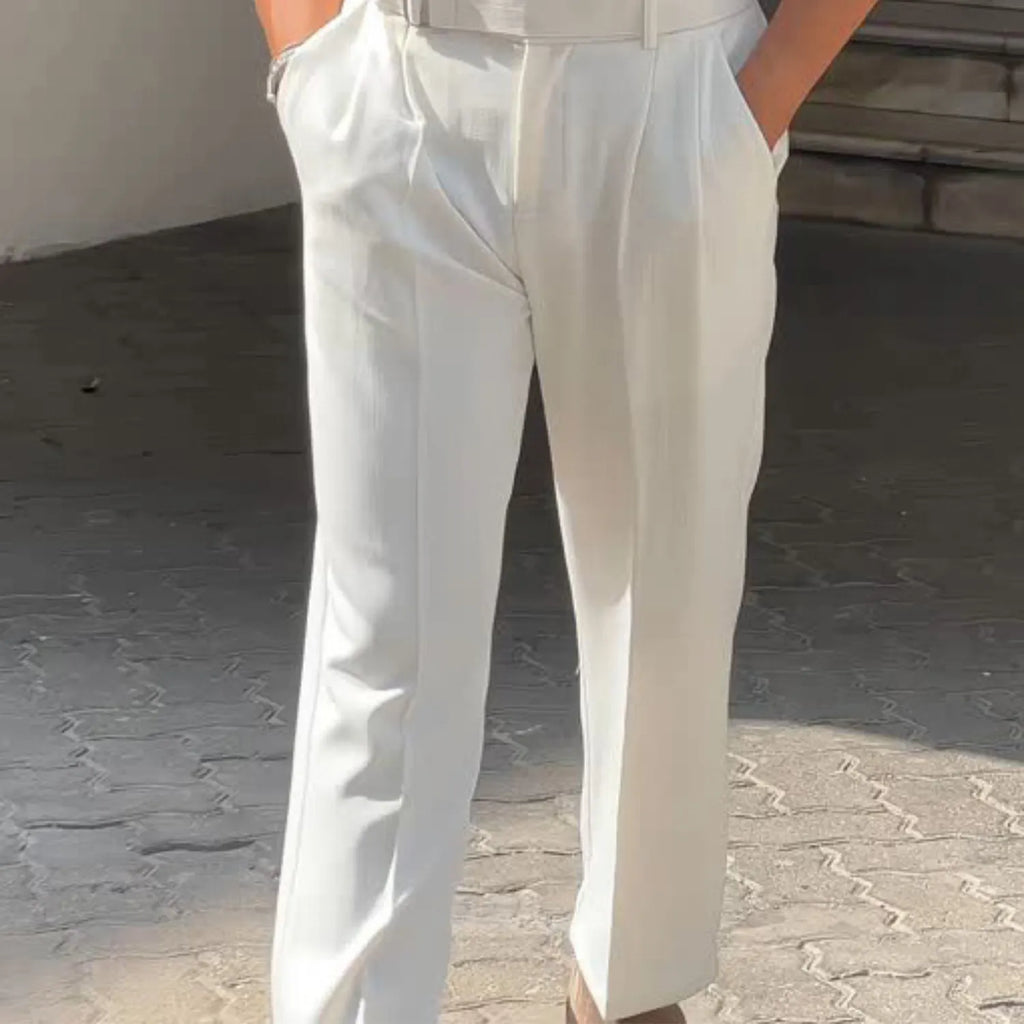Detailed view of the Baltere Men's High-Waisted Pleated Trousers, highlighting the classic pleat and elegant, fluid drape.