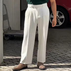 Men's High-Waisted Pleated Trousers white, showcasing the elegant fit and classic front pleats.