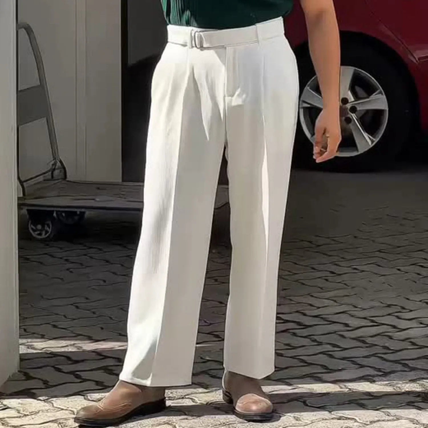 Men's High-Waisted Pleated Trousers white, showcasing the elegant fit and classic front pleats.