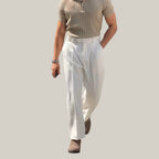 Baltere's Men's High-Waisted Pleated Trousers white, showcasing the elegant fit and classic front pleats.