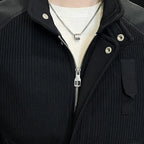 Baltere Men's Knitted Colour Block Coat, featuring a unique textured design, full-zip front, and ribbed cuffs in black.