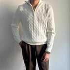 Model wearing Baltere's Men's Retro Pullover Sweater, showcasing its loose fit, knit texture, in white.