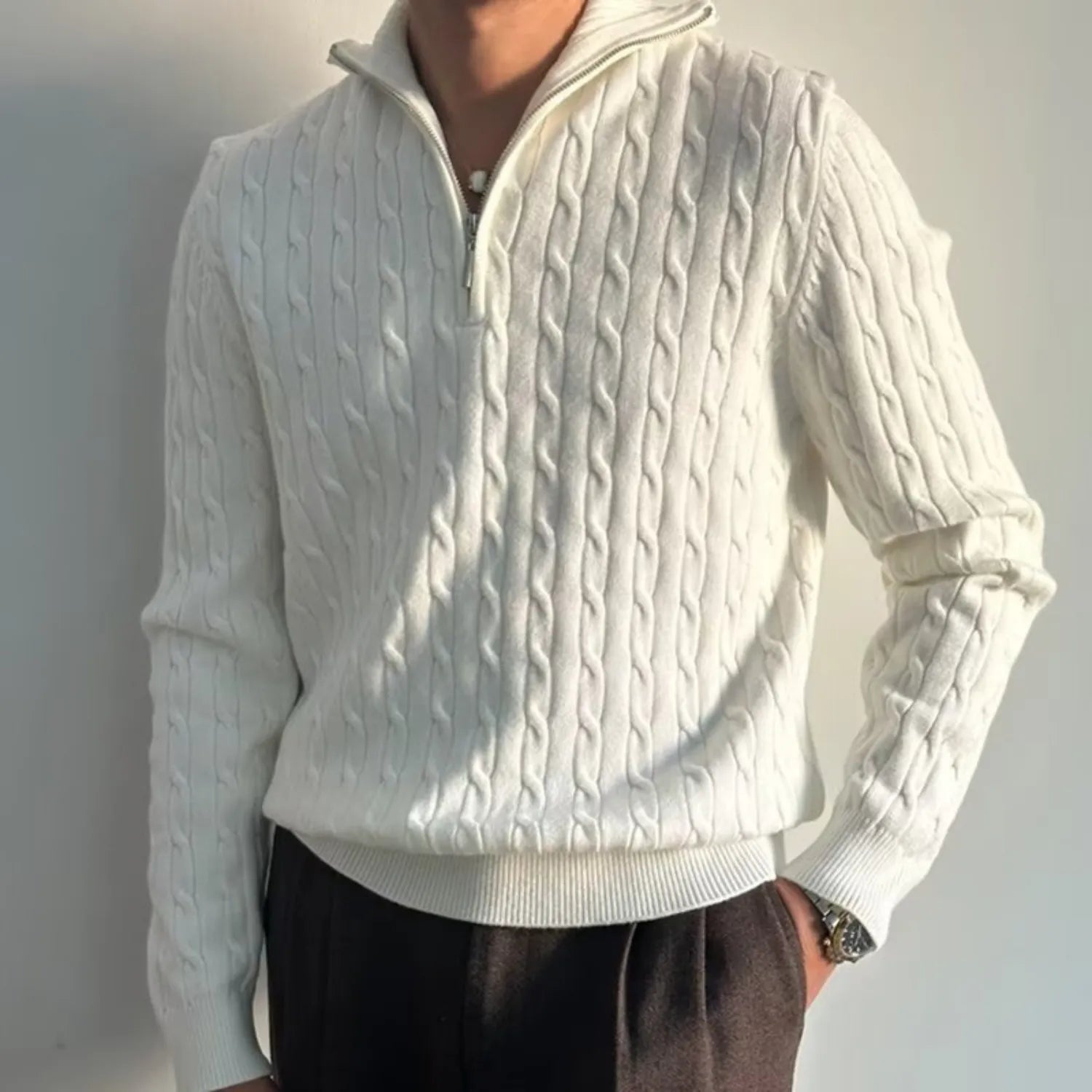 Model wearing Baltere's Men's Retro Pullover Sweater, showcasing its loose fit, comfortable style and knit texture.