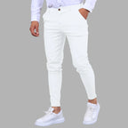 Model wearing Baltere's Men's Slim Fit Business Trousers, showcasing the modern tapered leg and versatile business-casual style in white.