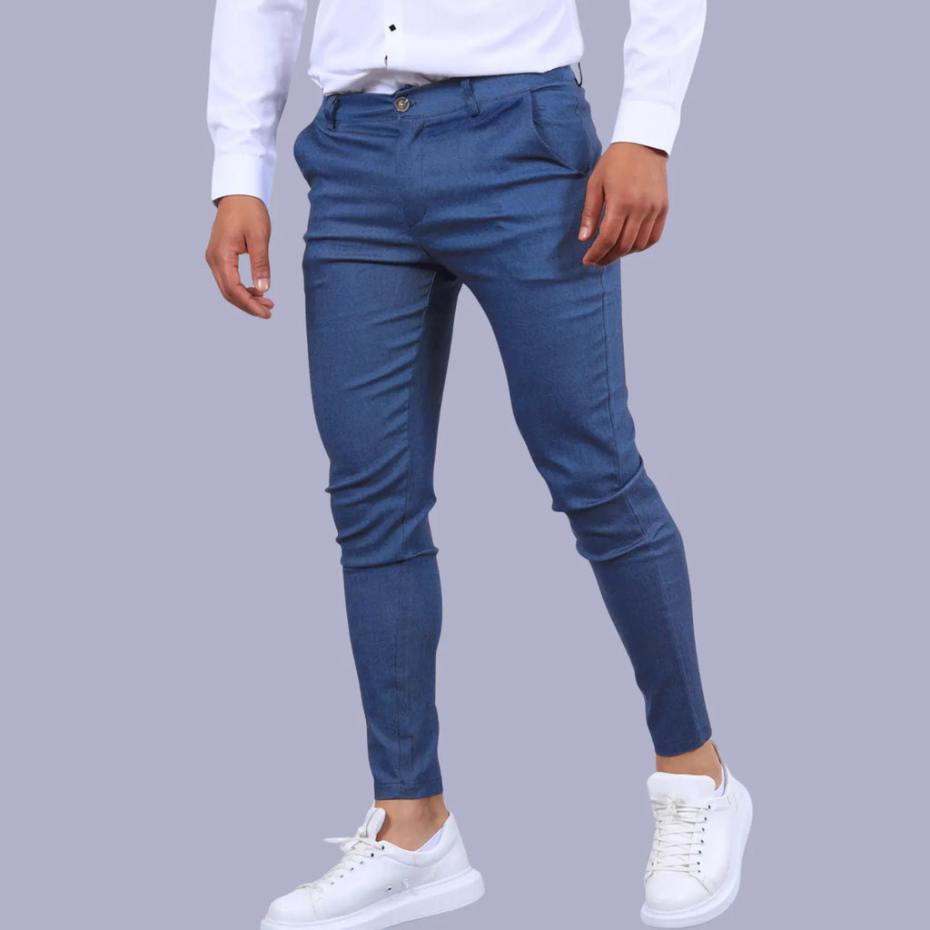 Model wearing Baltere's Men's Slim Fit Business Trousers, dark blue and versatile business-casual style.