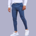 Model wearing Baltere's Men's Slim Fit Business Trousers, dark blue and versatile business-casual style.