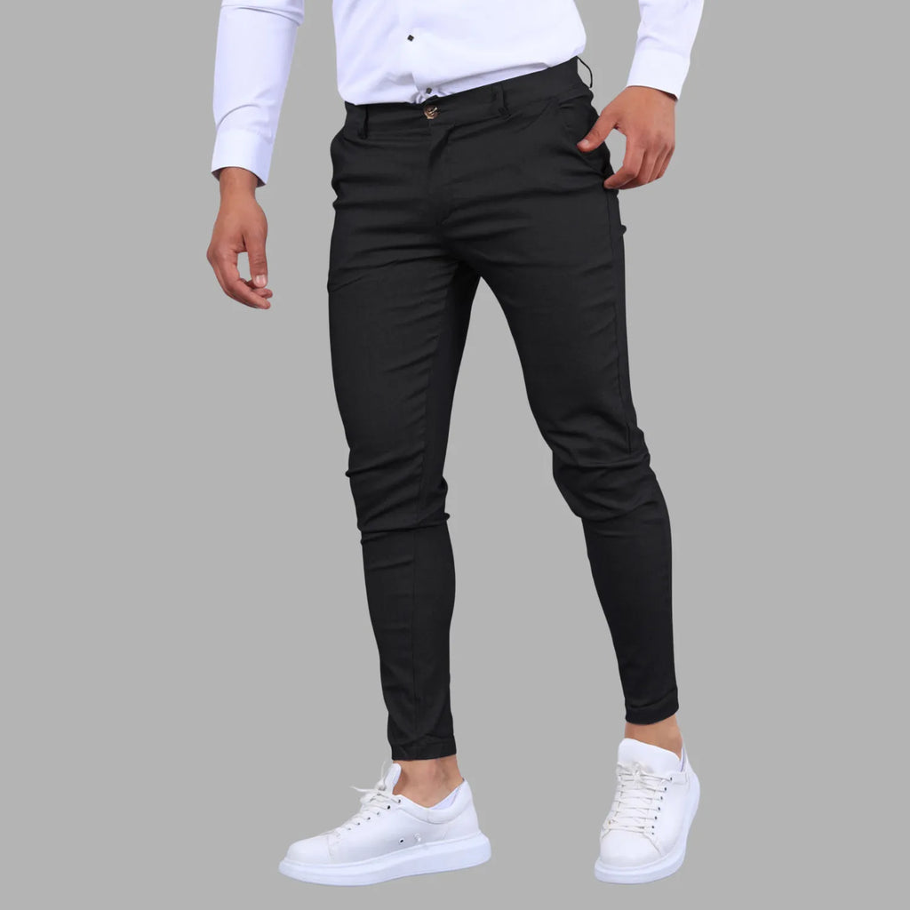 Model wearing Baltere's Men's Slim Fit Business Trousers, showcasing the modern tapered leg and versatile business-casual style in multi black.