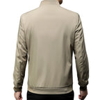 Model wearing Baltere's Modern Business Casual Jacket, showcasing its tailored fit, stand-up collar, and versatile style.