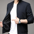 Model wearing Baltere's Modern Business Casual Jacket, showcasing its tailored fit, stand-up collar, and versatile style in black.