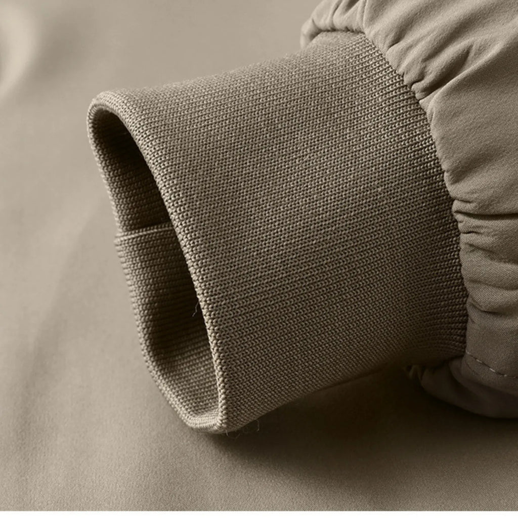 Close-up of the men's jacket ribbed cuff, highlighting its quality and comfortable fit.