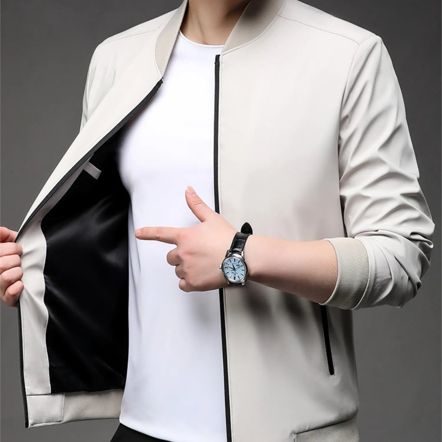 Model wearing Baltere's Modern Business Casual Jacket, showcasing its tailored fit, stand-up collar, and versatile style in beige.