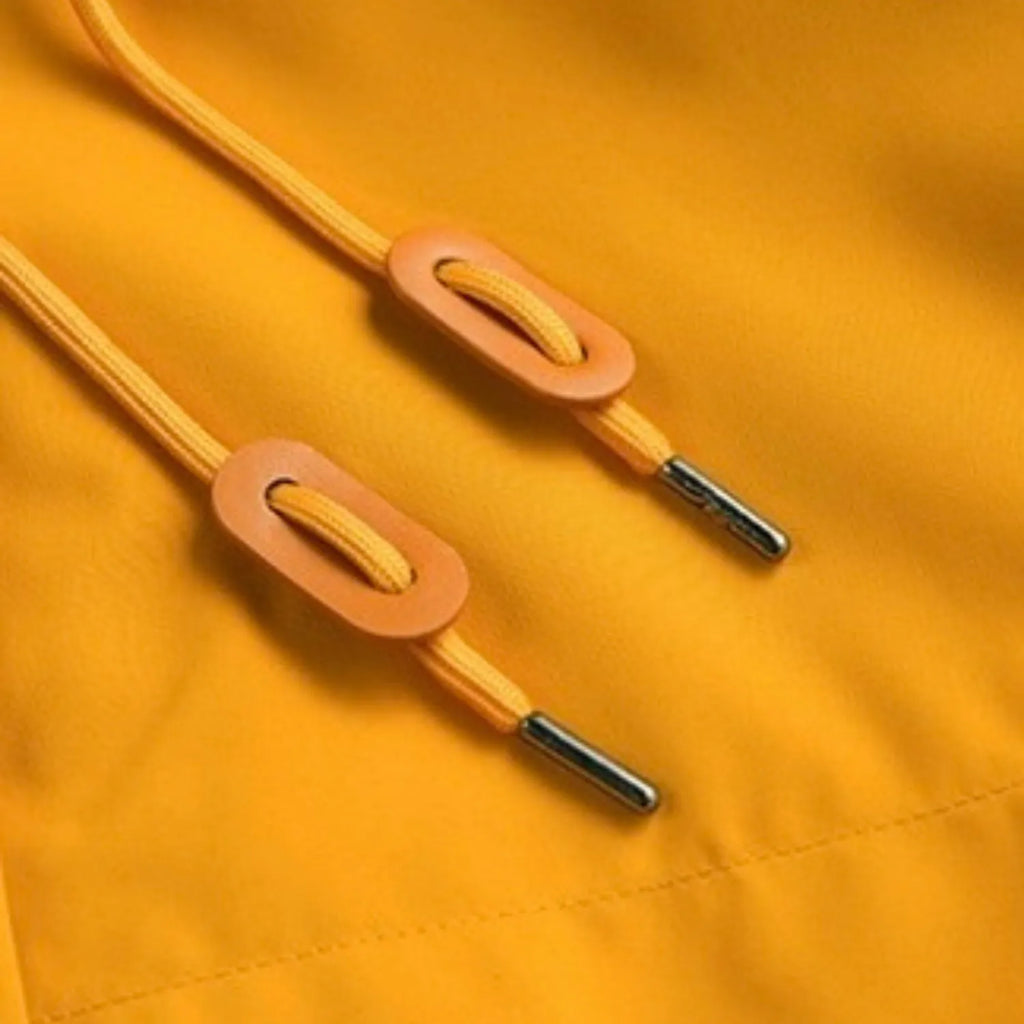 Close-up of the jacket's drawstrings, highlighting the durable material, metal tips, and adjustable toggles.