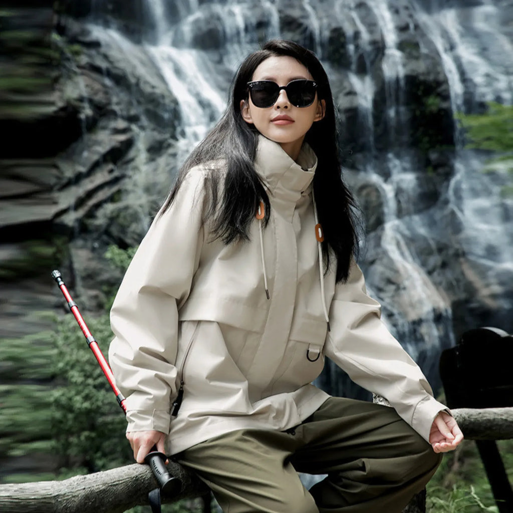 Baltere Women's 3-in-1 Waterproof Jacket khaki, showcasing the hooded design, dual layer system, and outdoor performance features.