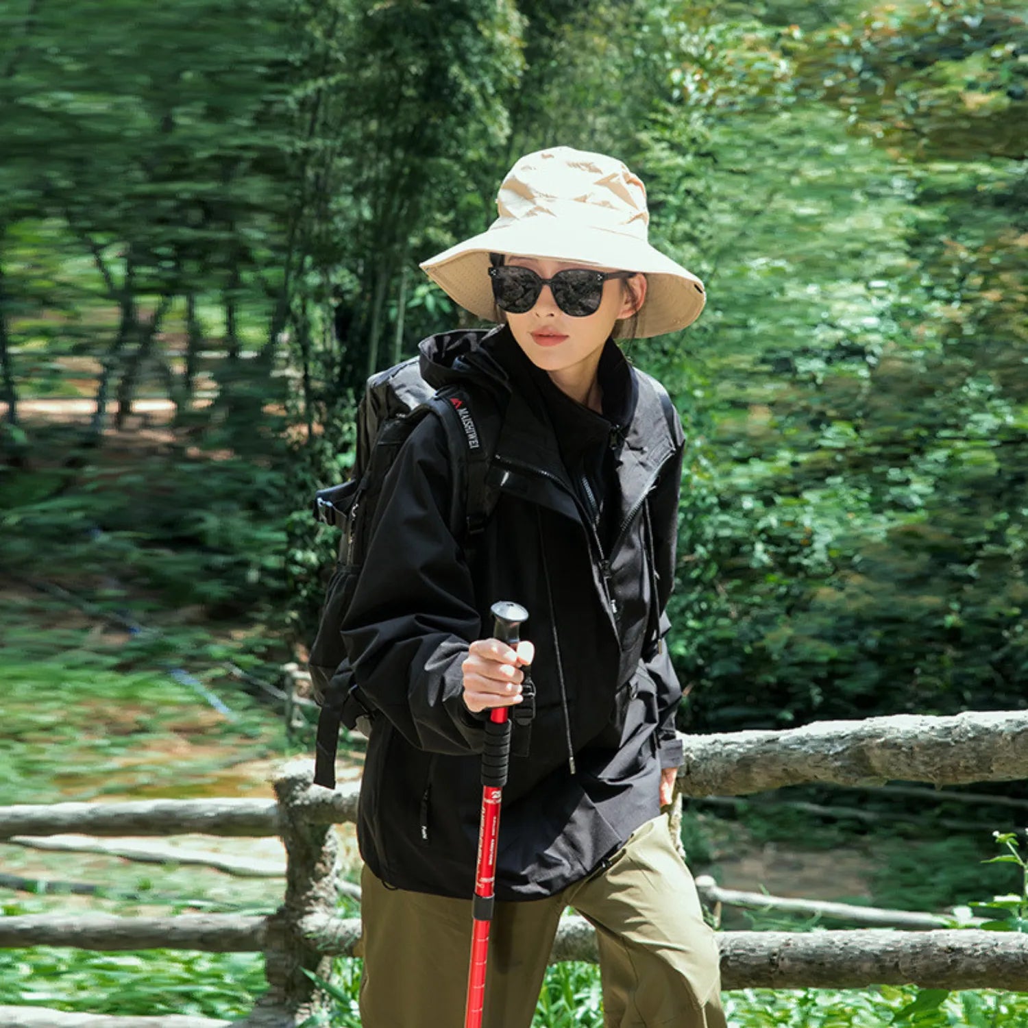 Baltere's waterproof jacket black, made from high-quality polyester, emphasizing the tailored fit and performance features.