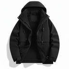 Baltere's Women's 3-in-1 Waterproof Jacket, in black, made from durable polyester, showcasing the hooded design and dual-layer system.