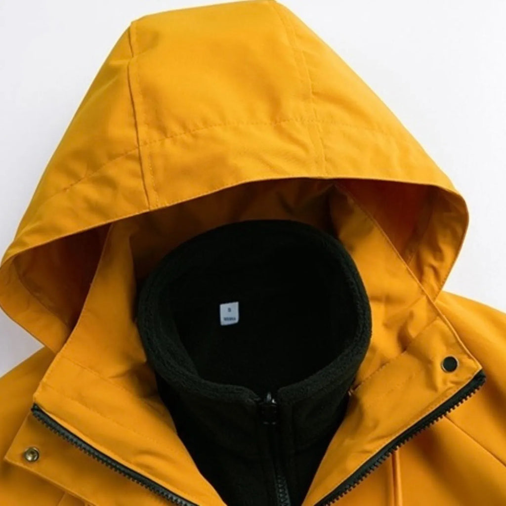 Close-up of the 3-in-1 jacket's hood and inner fleece layer, showcasing its protective design and warmth, in yellow.