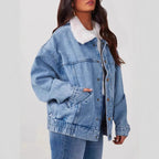 Model wearing Baltere's oversized denim jacket, highlighting its cozy sherpa collar and elasticized hem.