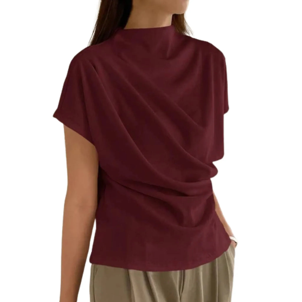 Model wearing Baltere's Draping Short Sleeve Pullover Top wine, showcasing the elegant cowl neckline and relaxed fit.