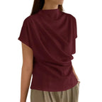 Model wearing Baltere's Draping Short Sleeve Pullover Top wine, showcasing the elegant cowl neckline and relaxed fit.