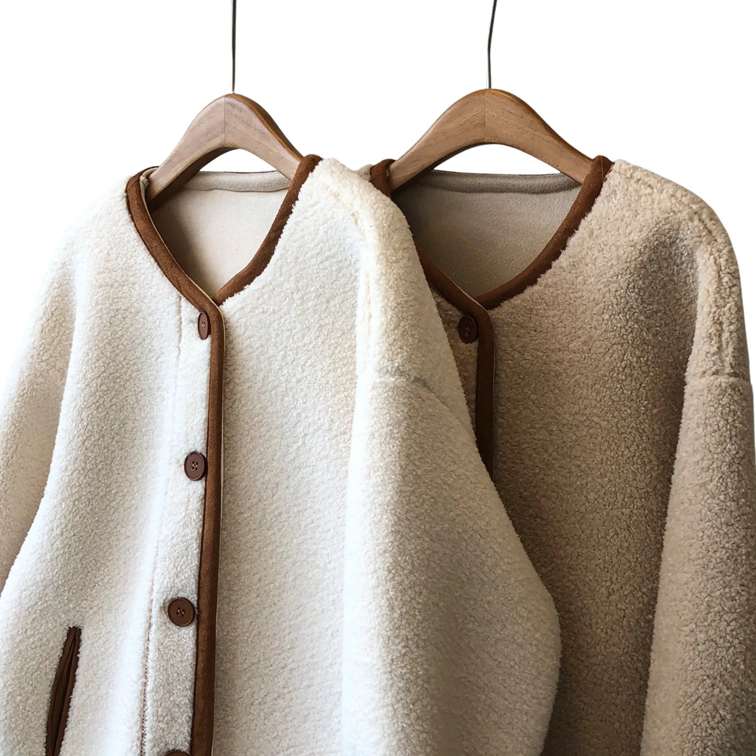 Side-by-side view of the Baltere reversible sherpa coat, highlighting the two-toned design and contrasting textures.