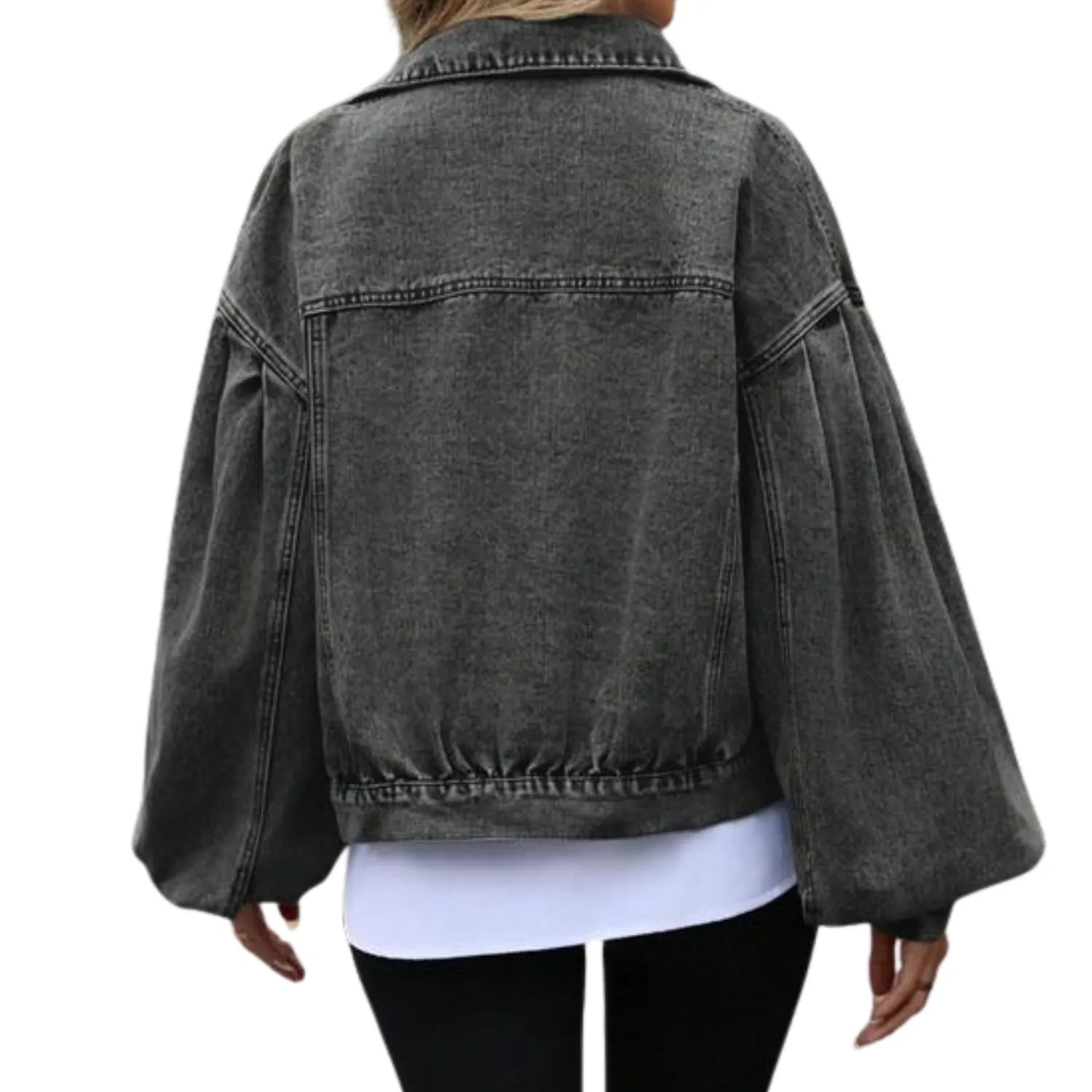Rear view of the Baltere women's jacket, showcasing its oversized fit, classic stitching, and balloon sleeves with an elastic hem.