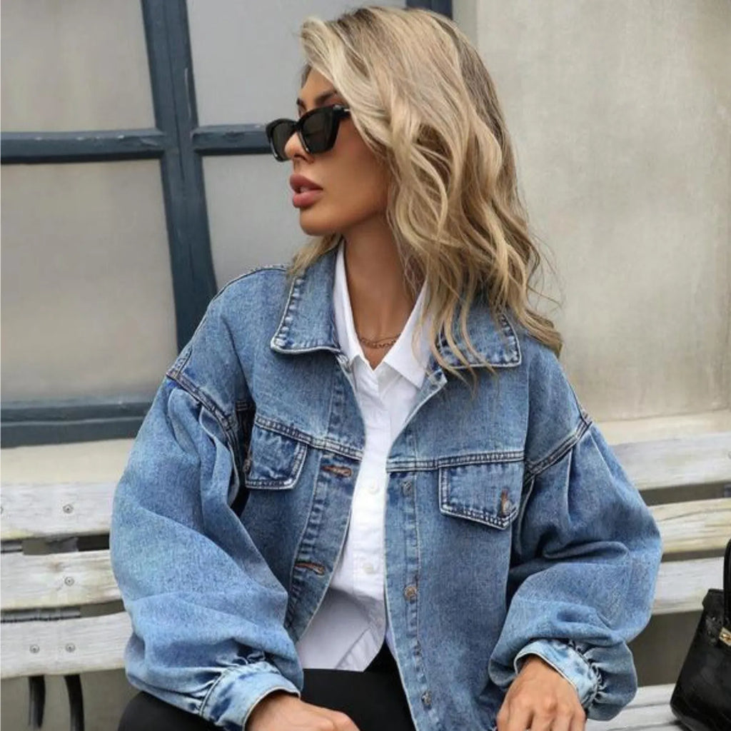 Model wearing Baltere's Women's Embossed Denim Jacket, showcasing its slim fit, button-up front.