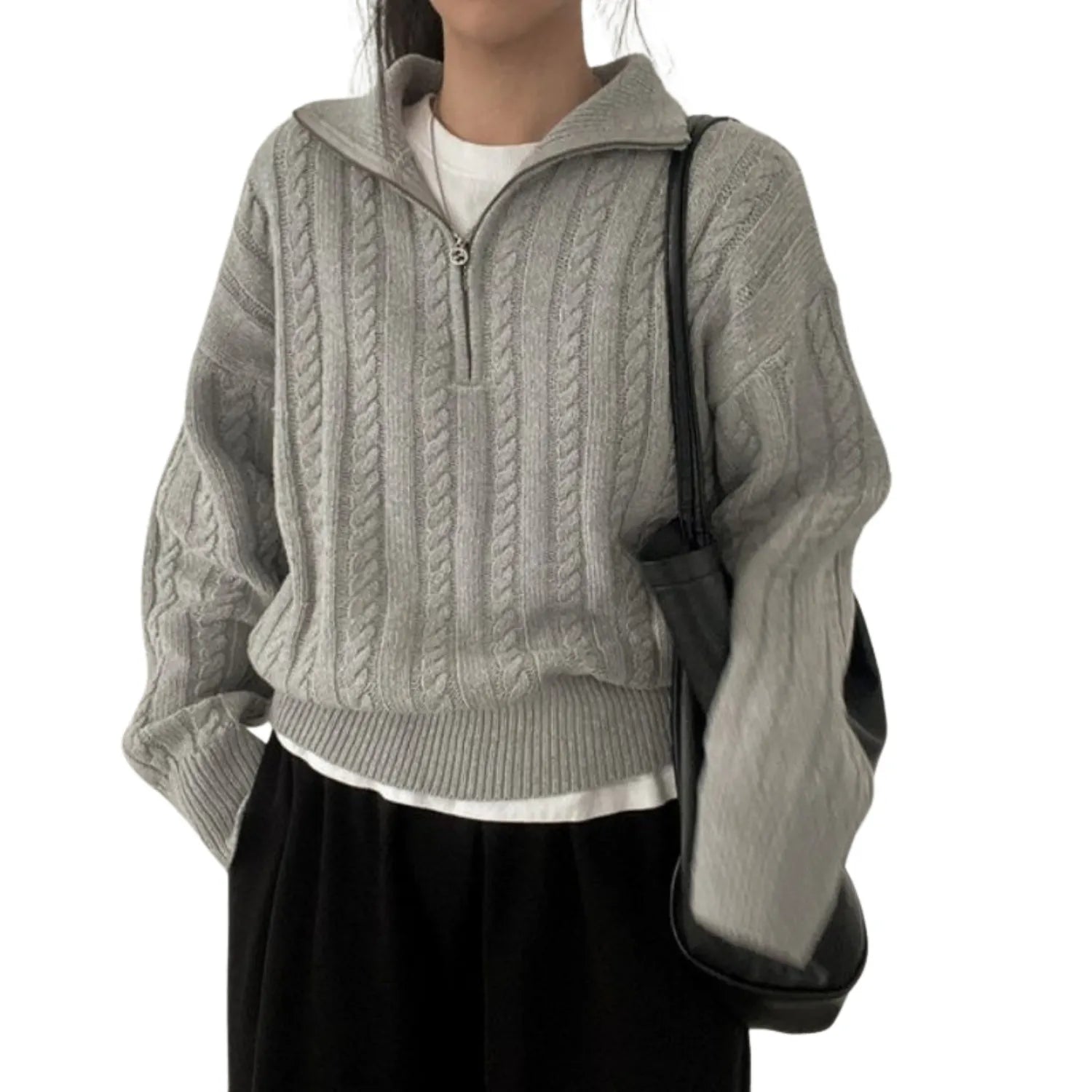 Model wearing Baltere's Women's High-Collar Zipper Pullover Top, showcasing its modern high-collar design and quarter-zip feature.