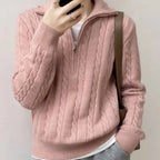 Model wearing Baltere's Women's High-Collar Zipper Pullover Top, showcasing its modern high-collar design and quarter-zip feature in pink.