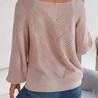 Rear view of Baltere's Hollow-Out Lantern Sleeve Sweater pink, showcasing the knit texture, raglan sleeves, and decorative pattern.