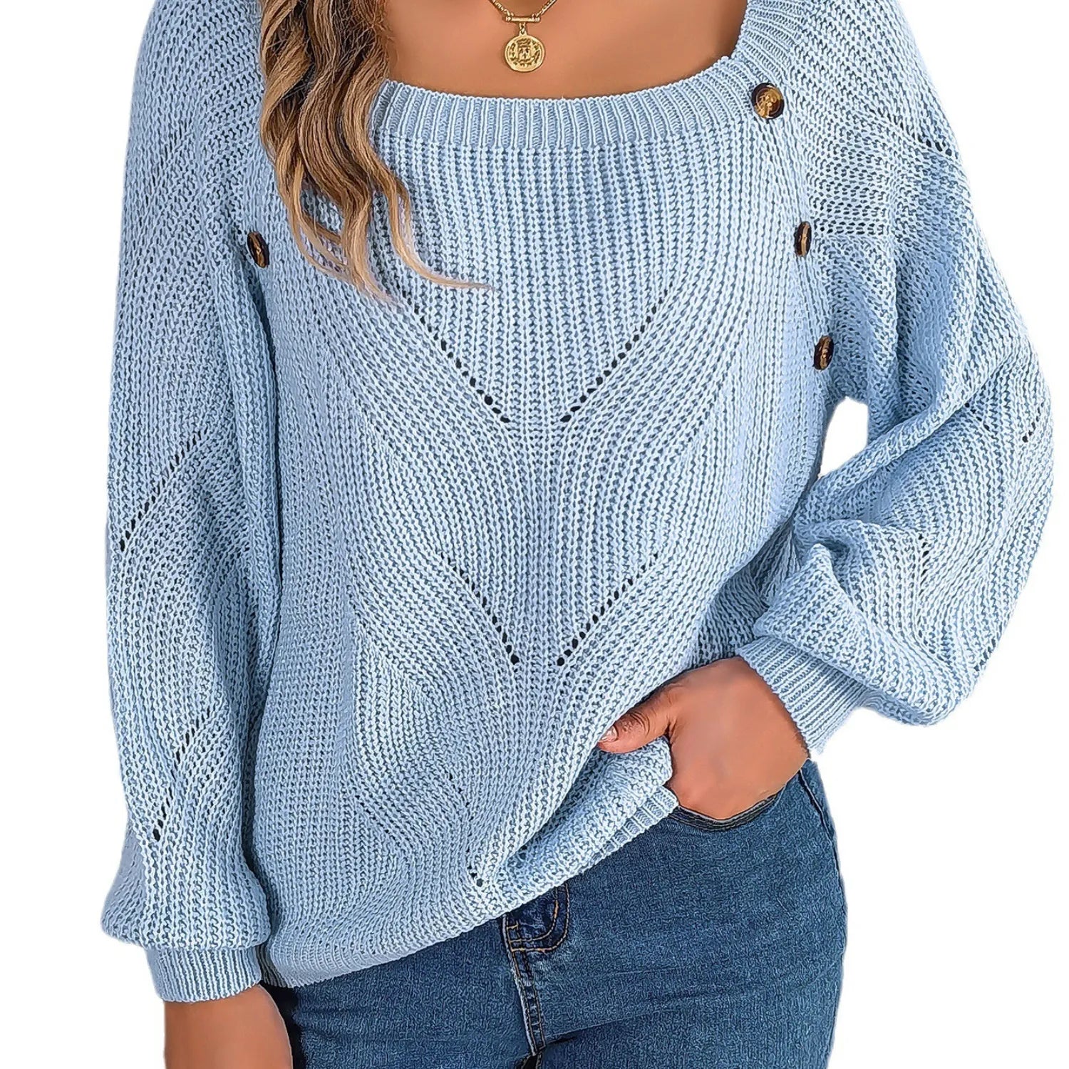 Model wearing Baltere's cozy sweater, highlighting the comfortable loose fit in light blue.