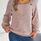 Model wearing Baltere's romantic Hollow-Out Lantern Sleeve Sweater, featuring a delicate knit, square neckline, and charming side buttons.