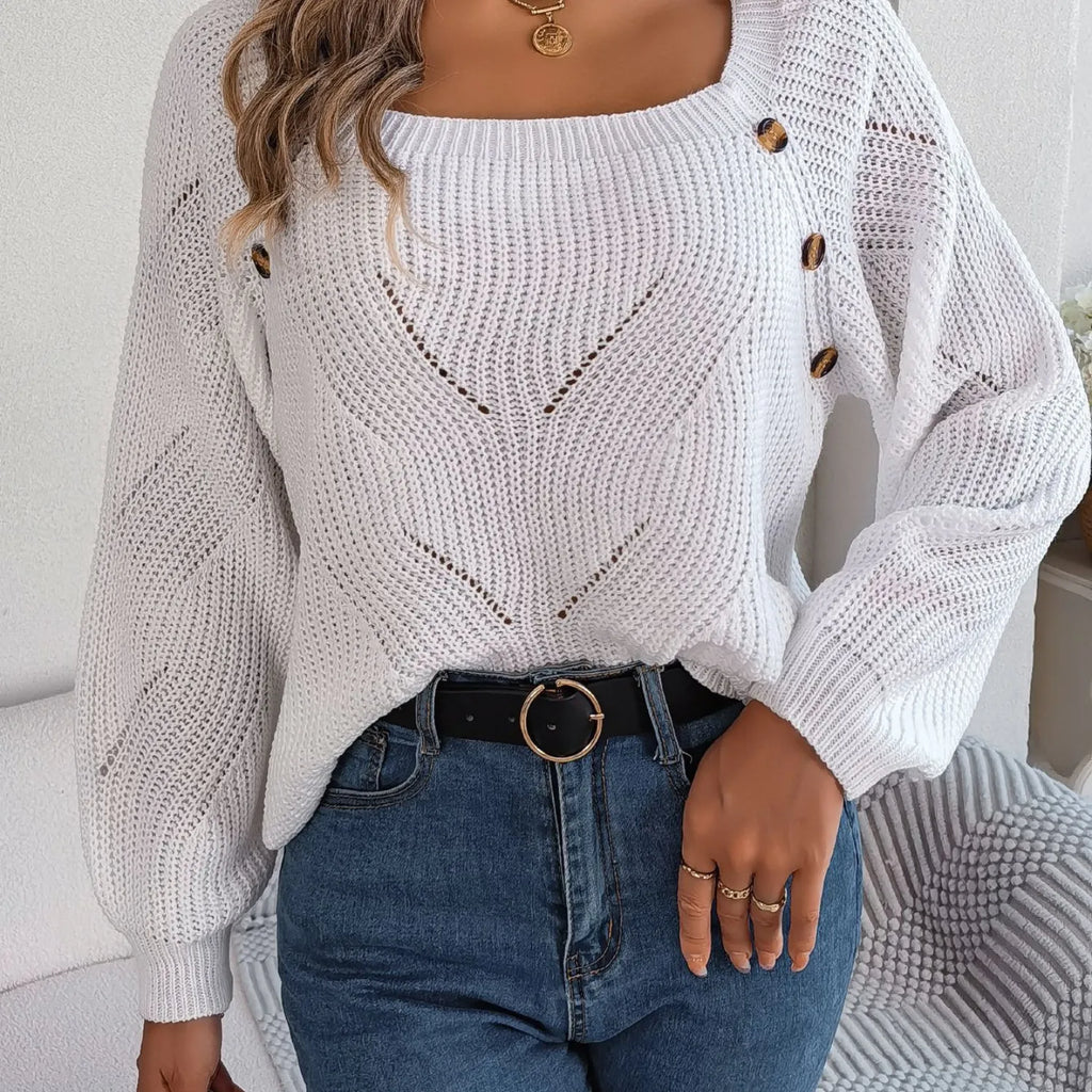 Baltere's cozy sweater white, highlighting the comfortable loose fit and decorative side buttons.