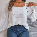 Model wearing Baltere's Hollow-Out Lantern Sleeve Sweater, showcasing the stylish square neck and subtle knit pattern, in white.