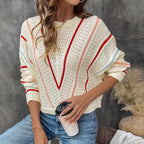 Model wearing Baltere's Hollow Out Sweater, featuring a V-stripe pattern.