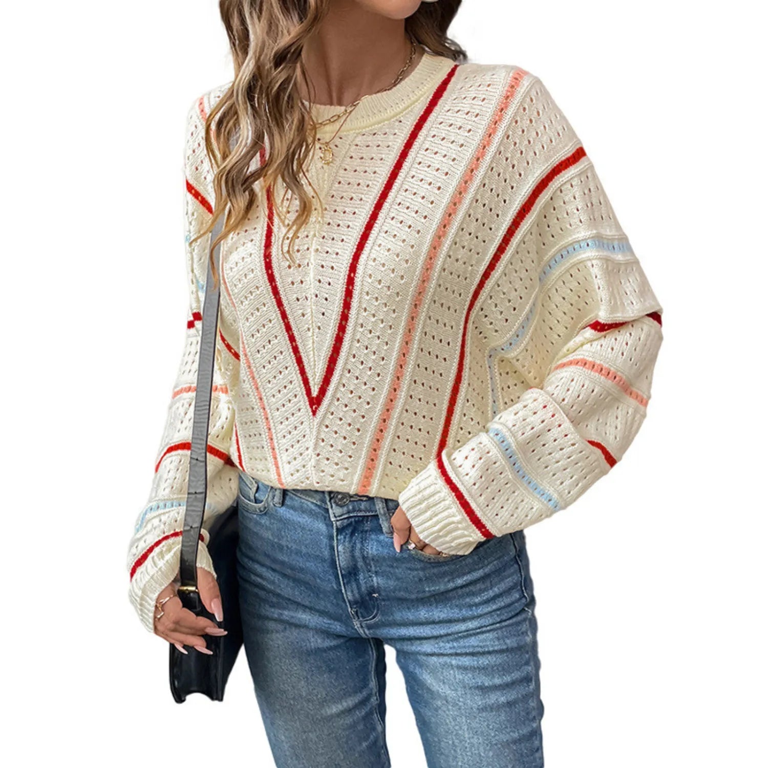 Model wearing Baltere's Hollow Out Sweater beige, featuring a V-stripe pattern and a relaxed fit.