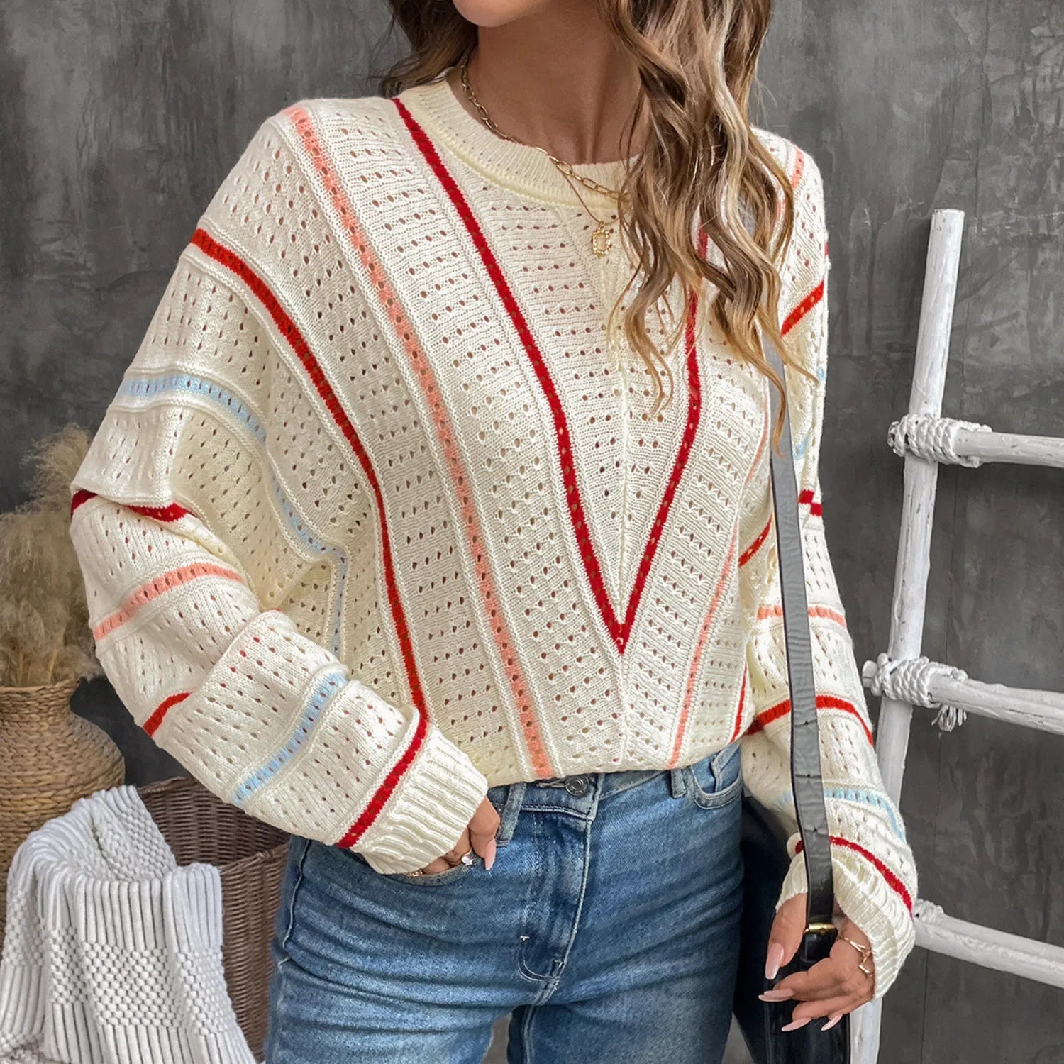 Baltere's Hollow Out Sweater, featuring a V-stripe pattern in beige.